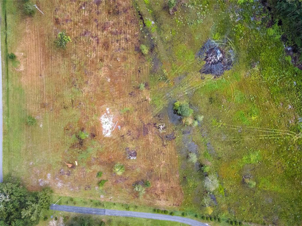 0 Windwillow Lane Clermont, FL 34714 - Photo 14 of 22 a bathroom with a shower curtain