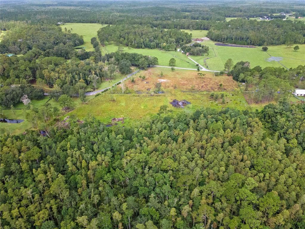 0 Windwillow Lane Clermont, FL 34714 - Photo 19 of 22 a view of a lake with a houses