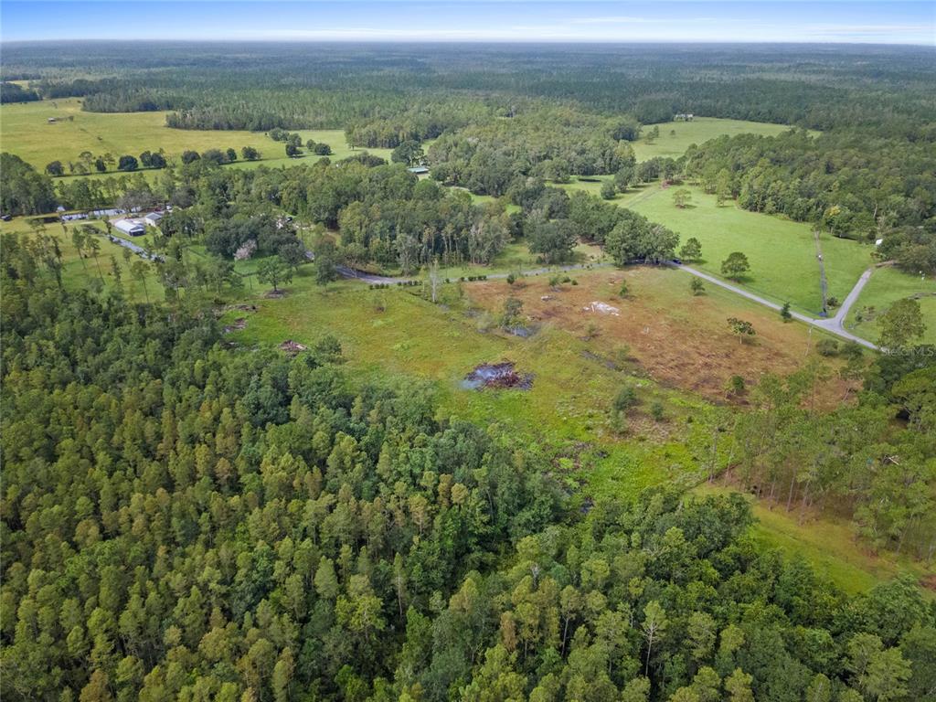 0 Windwillow Lane Clermont, FL 34714 - Photo 5 of 22 an aerial view of residential houses with outdoor space and trees