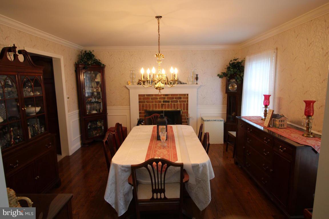 546 Koser Road Lititz, PA 17543 - Photo 3 of 30 a view of a dining room with furniture and chandelier