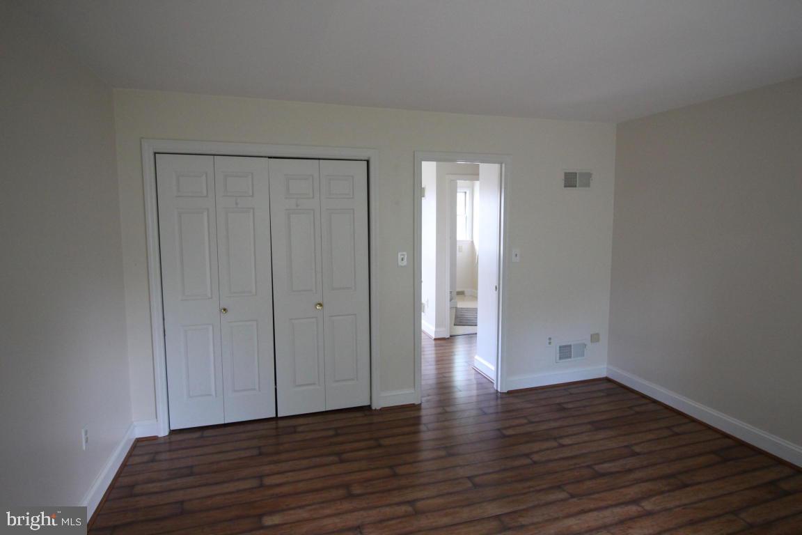546 Koser Road Lititz, PA 17543 - Photo 22 of 30 a view of an empty room and wooden floor