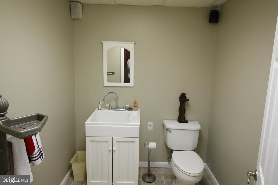 546 Koser Road Lititz, PA 17543 - Photo 27 of 30 a bathroom with a toilet a sink and mirror