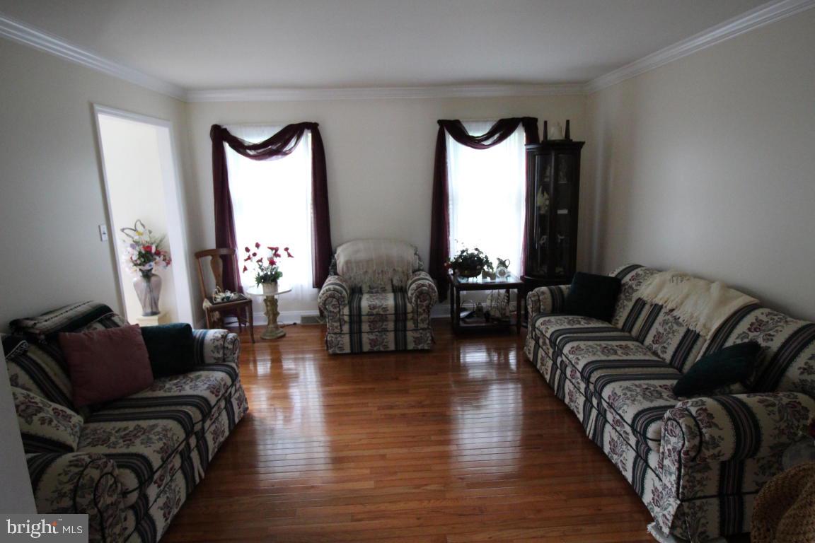 546 Koser Road Lititz, PA 17543 - Photo 4 of 30 a living room with furniture or lamp and a large window