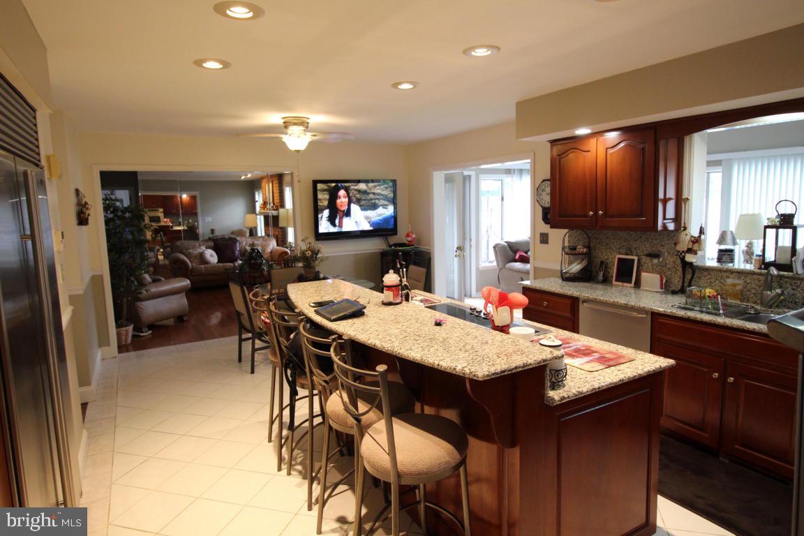 546 Koser Road Lititz, PA 17543 - Photo 10 of 30 a large kitchen with a table and chairs