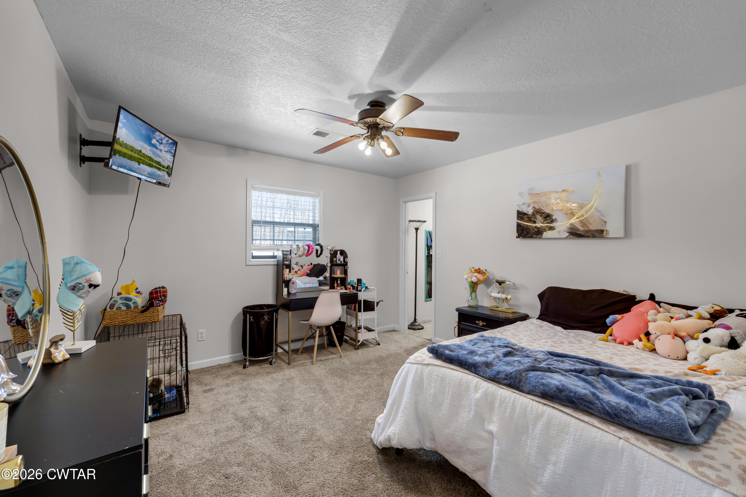 67 Robert Crocker Road Bradford, TN 38316 - Photo 8 of 20 a bedroom with a bed and furniture