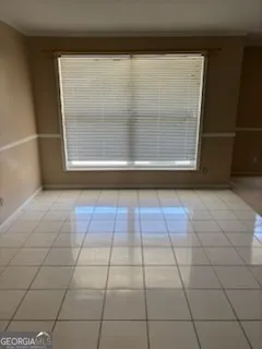 a view of a room with windows