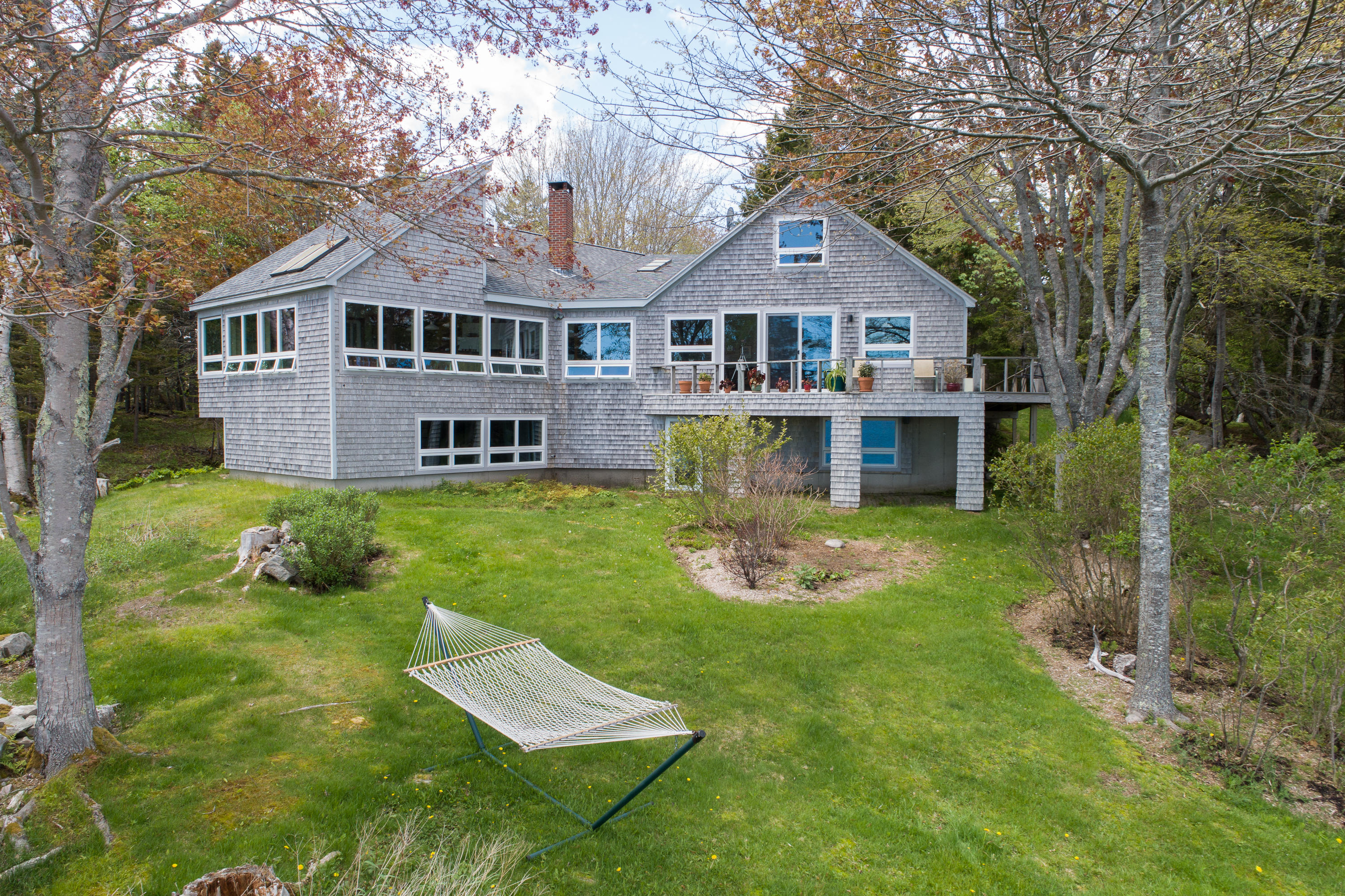 127 Paul Bunyan Road Corea, ME 04624 - Photo 1 of 46 Waterside of house from the beach.