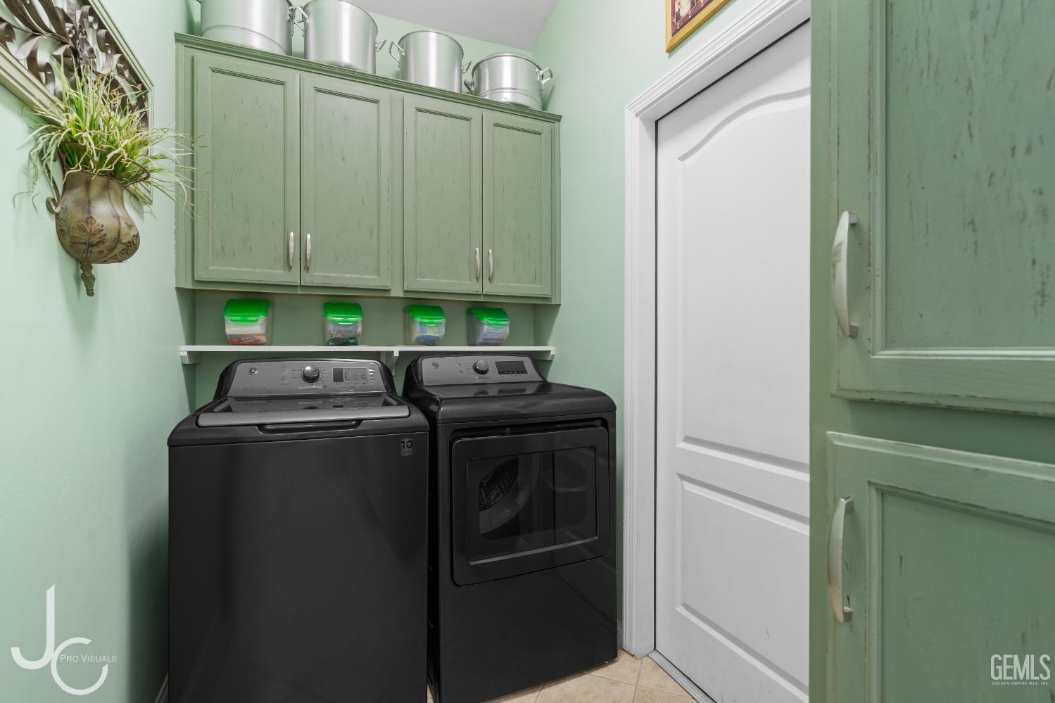 Undisclosed Address Bakersfield, CA 93312 - Photo 12 of 46 a utility room with dryer and washer