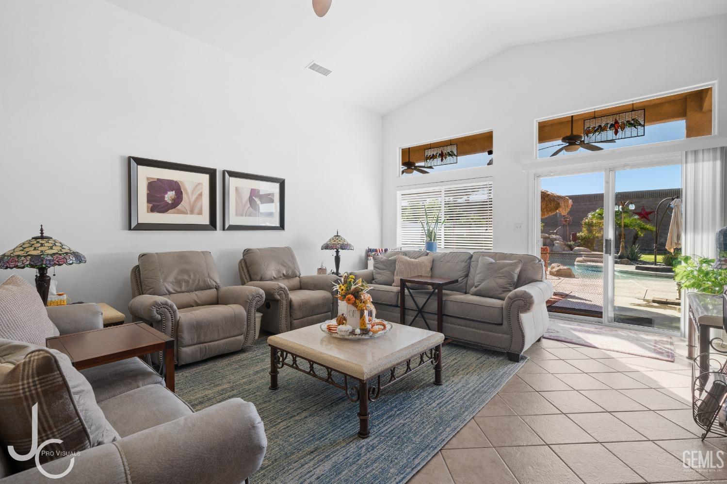 Undisclosed Address Bakersfield, CA 93312 - Photo 18 of 46 a living room with furniture and a large window