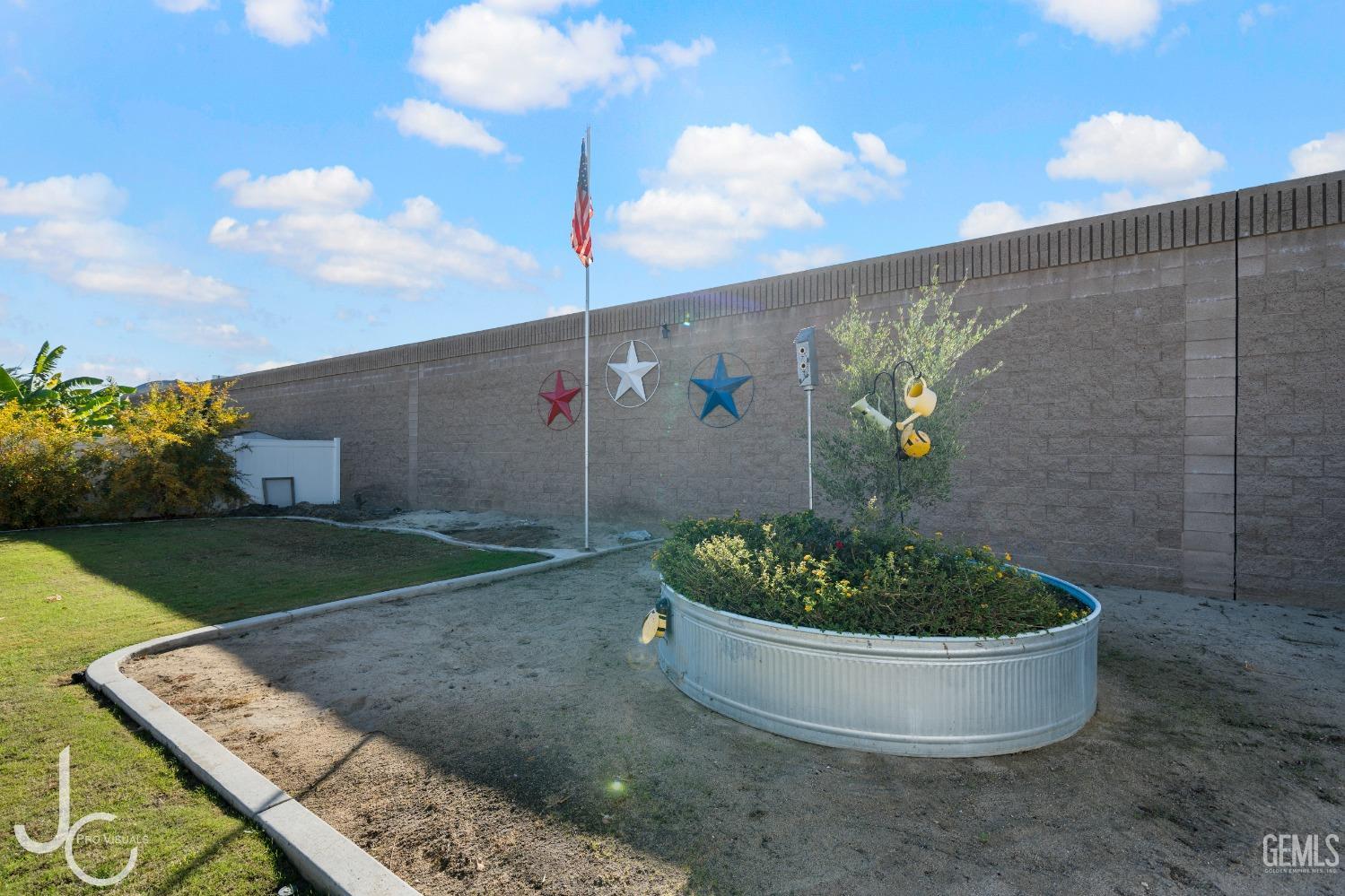 Undisclosed Address Bakersfield, CA 93312 - Photo 37 of 46 a view of a garden