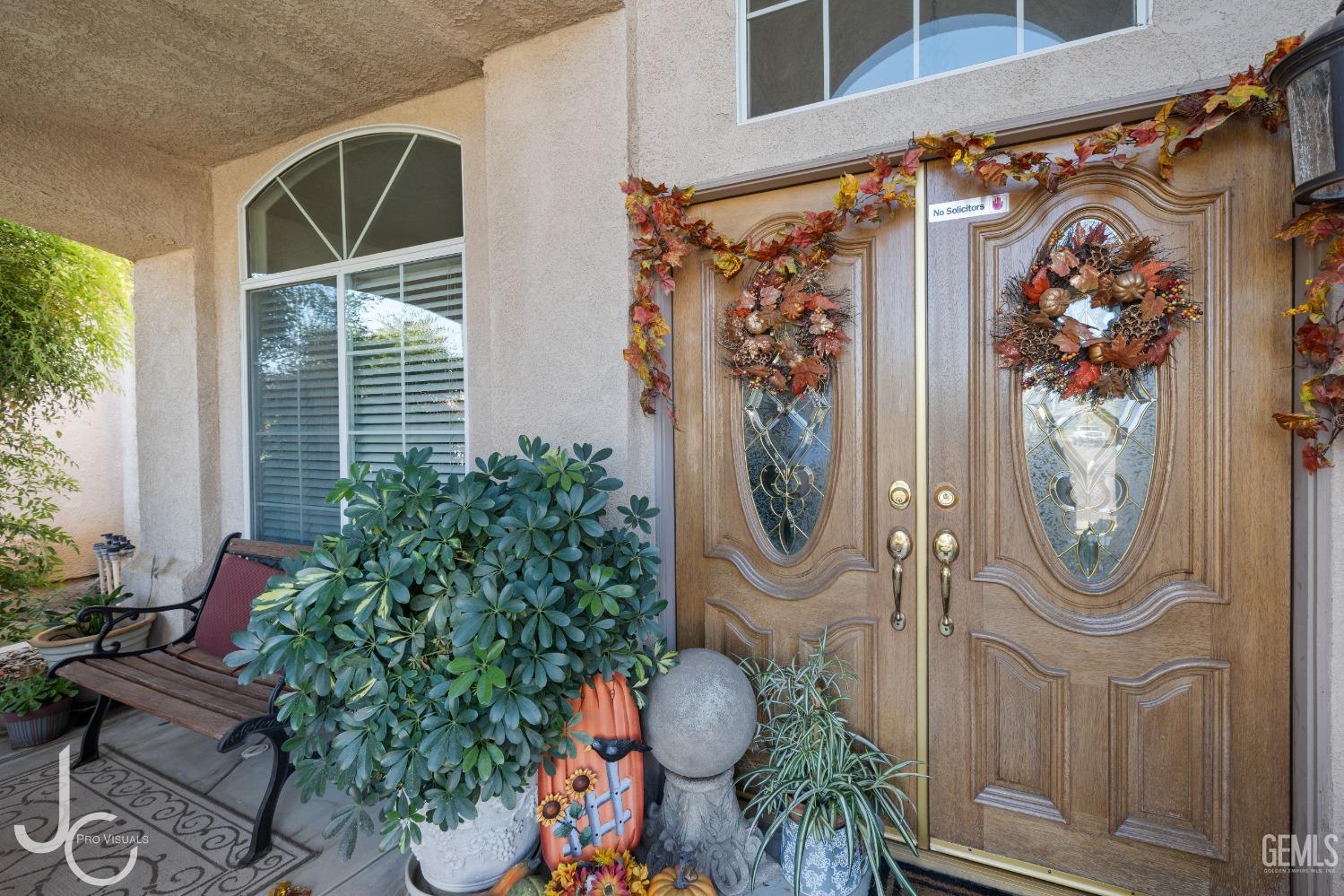 Undisclosed Address Bakersfield, CA 93312 - Photo 4 of 46 a front view of a house with garden and furniture