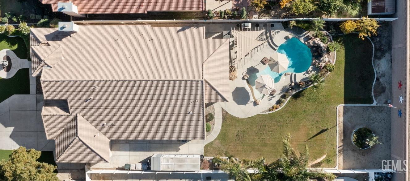 Undisclosed Address Bakersfield, CA 93312 - Photo 44 of 46 a view of a house with a window and potted plants