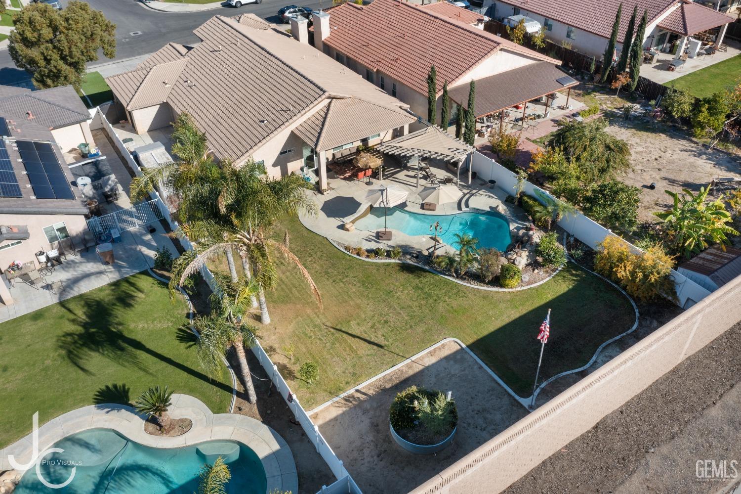 Undisclosed Address Bakersfield, CA 93312 - Photo 45 of 46 an aerial view of a house with a yard