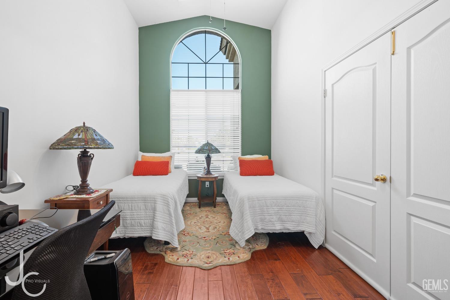 Undisclosed Address Bakersfield, CA 93312 - Photo 7 of 46 a bedroom with furniture and a wooden floor