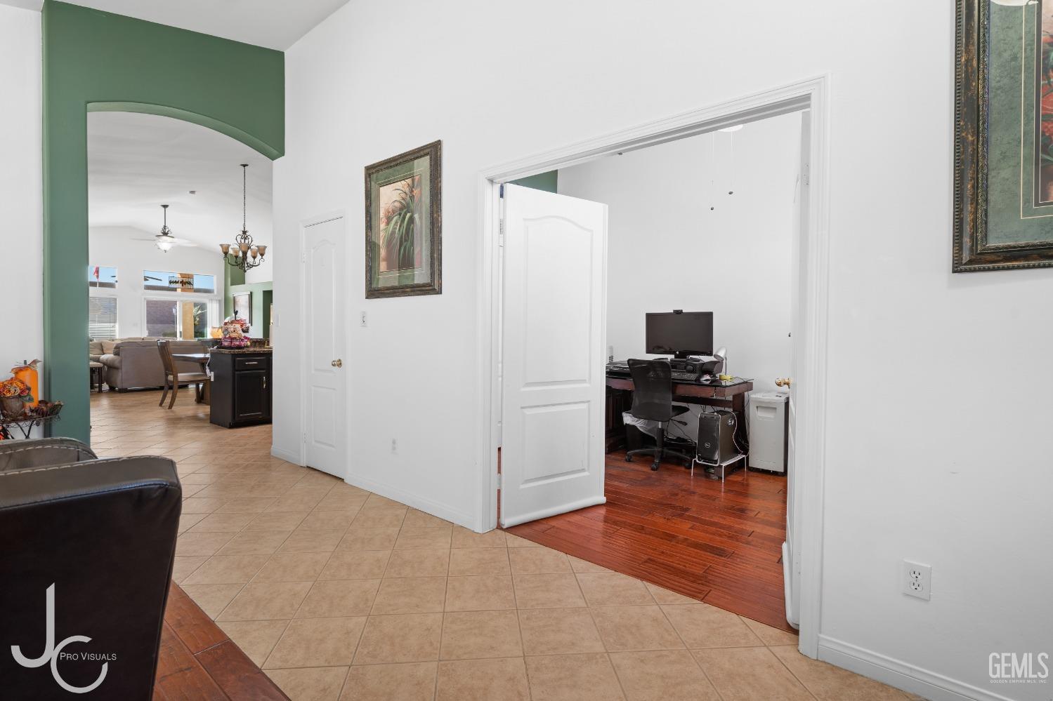 Undisclosed Address Bakersfield, CA 93312 - Photo 8 of 46 a living room with furniture and a mirror
