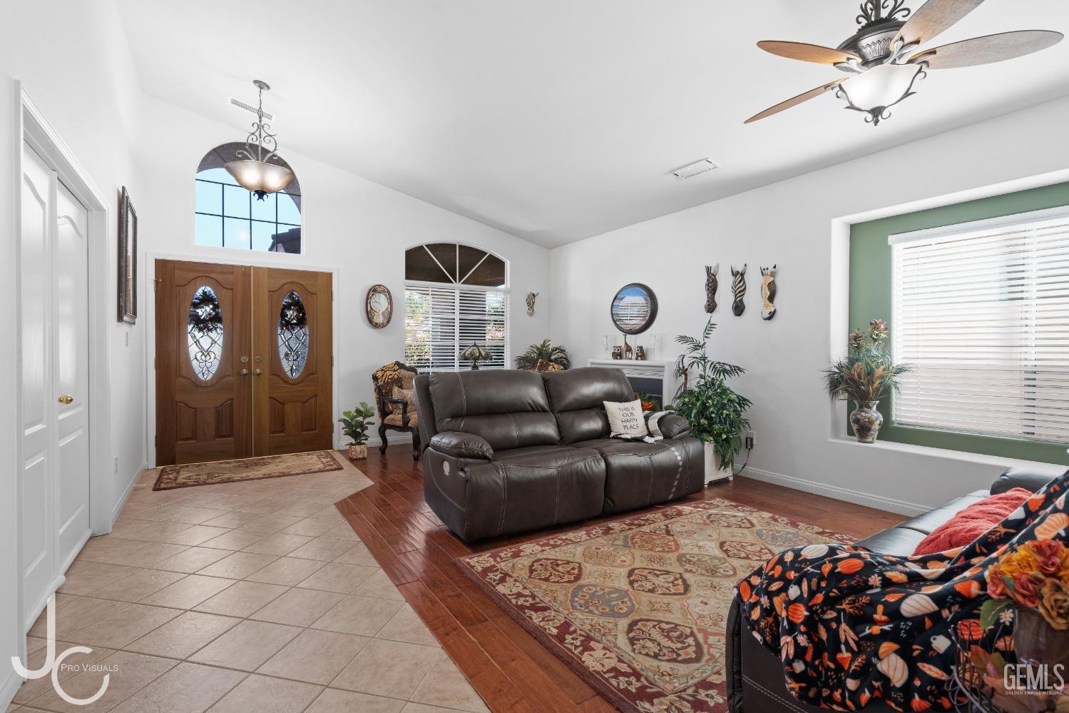 Undisclosed Address Bakersfield, CA 93312 - Photo 10 of 46 a bedroom with furniture and a chandelier