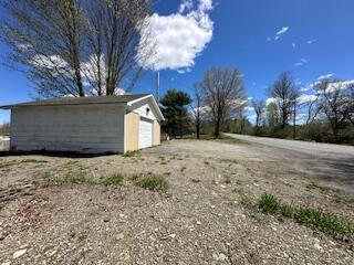 189 St Albans Road Corinna, ME 04928 - Photo 5 of 30 left side of garage