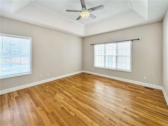 a bathroom with a tub and a shower