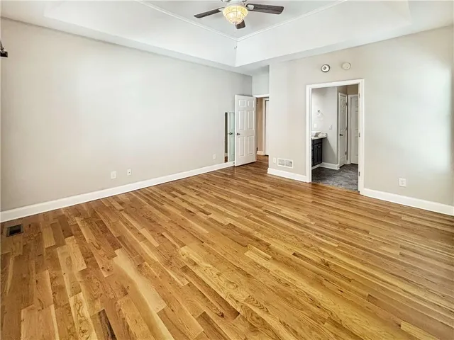 a view of a room with white walls