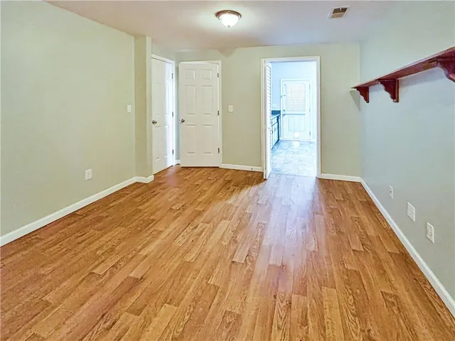 a bathroom with a sink vanity and a mirror