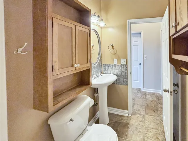 a view of an empty room with a large window