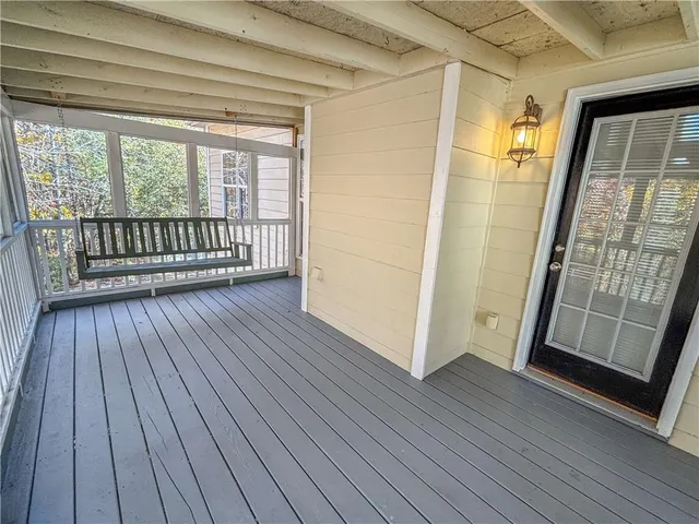 a view of a house with a snow in the yard