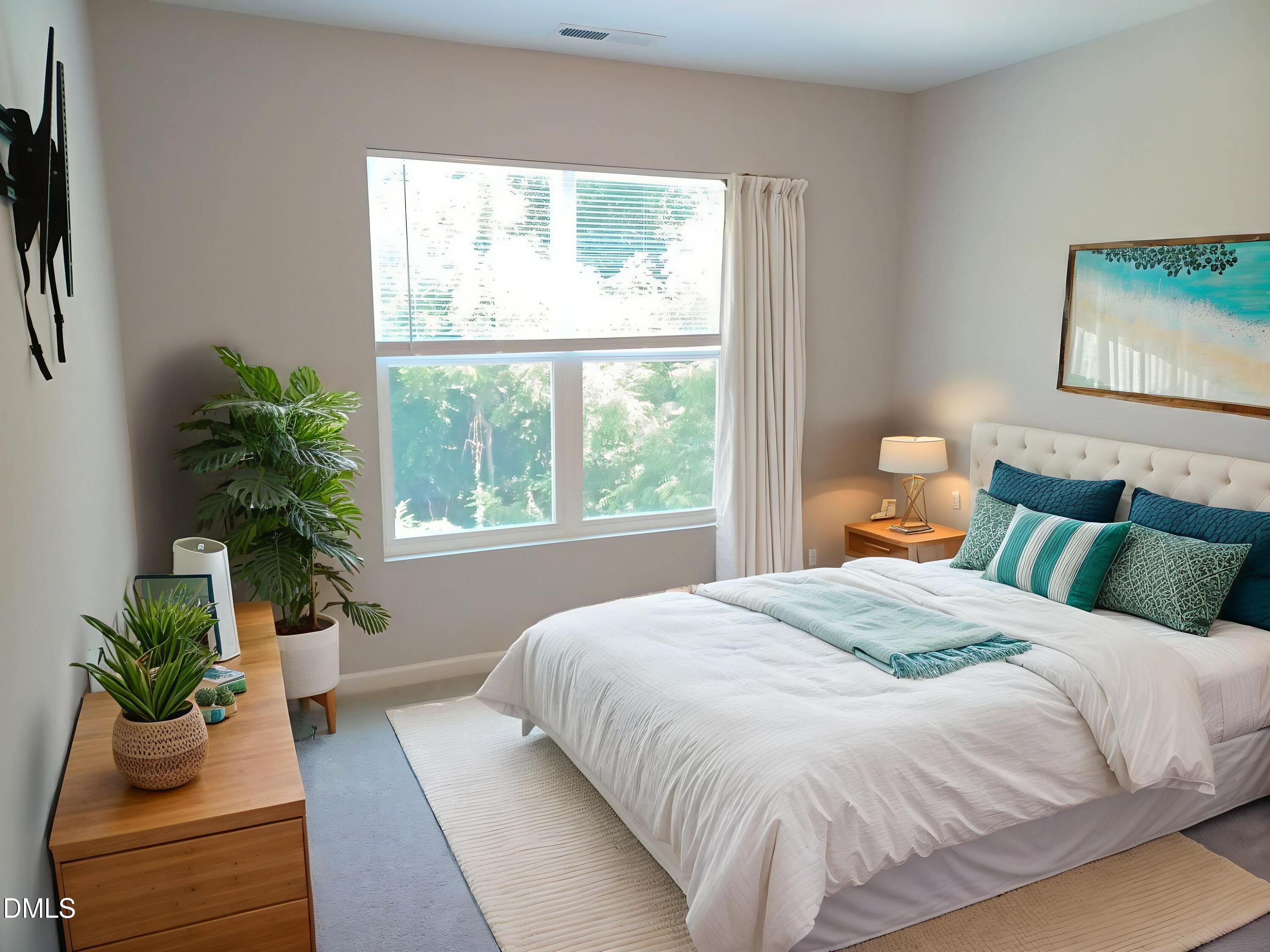 424 Cherry Street Fuquay-Varina, NC 27526 - Photo 17 of 28 a large white bed sitting in a bedroom next to a window