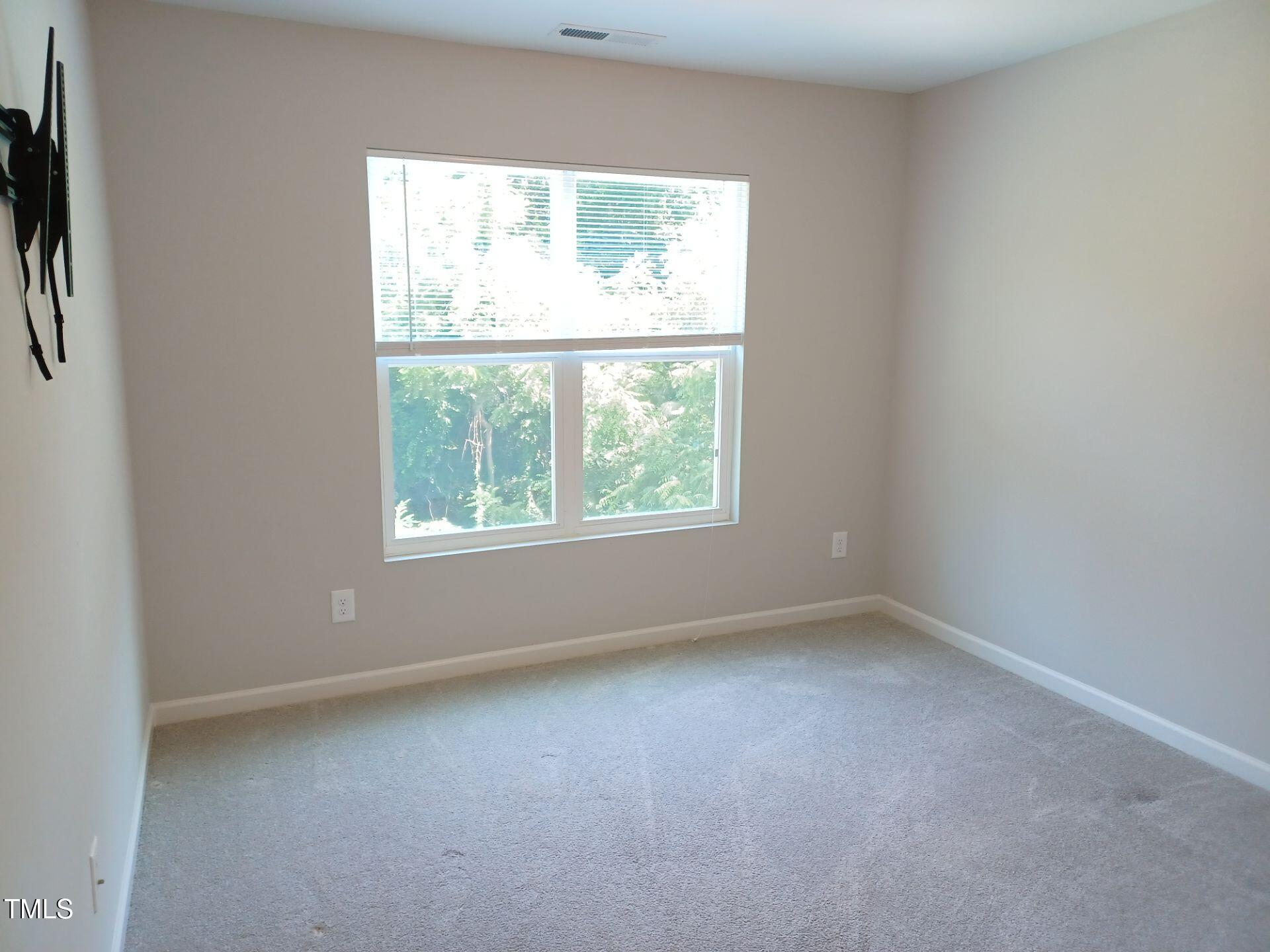 424 Cherry Street Fuquay-Varina, NC 27526 - Photo 18 of 28 an empty room with a window