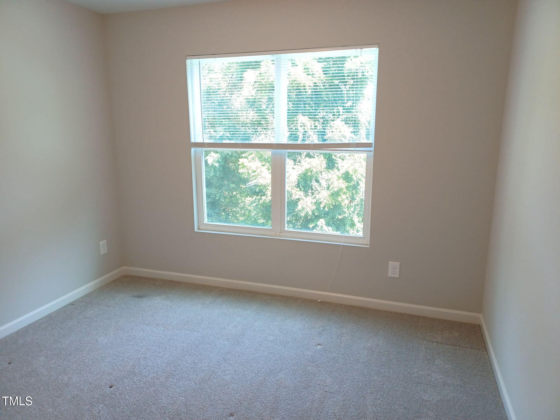 424 Cherry Street Fuquay-Varina, NC 27526 - Photo 21 of 28 an empty room with a window