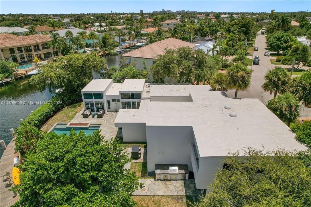 4050 Northeast 25th Avenue Lighthouse Point, FL 33064 - Photo 28 of 35 an aerial view of a house with a garden