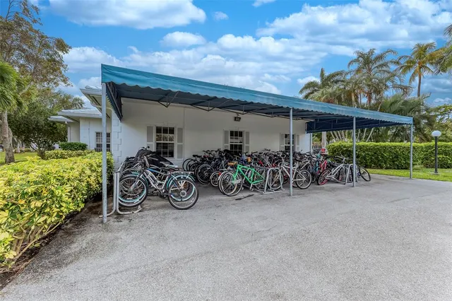 a couple of bicycles parked in front of house