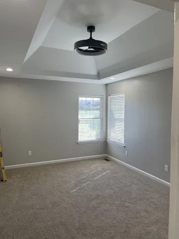 a view of an empty room and window