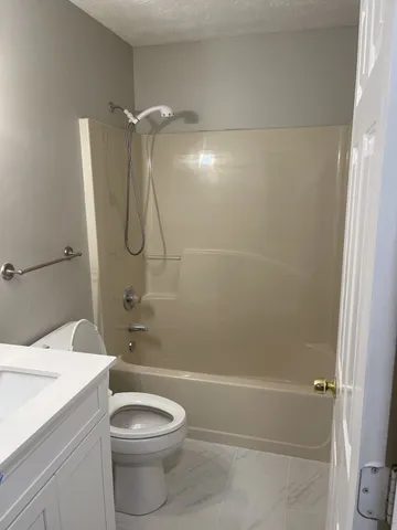 a view of a hallway with closet area