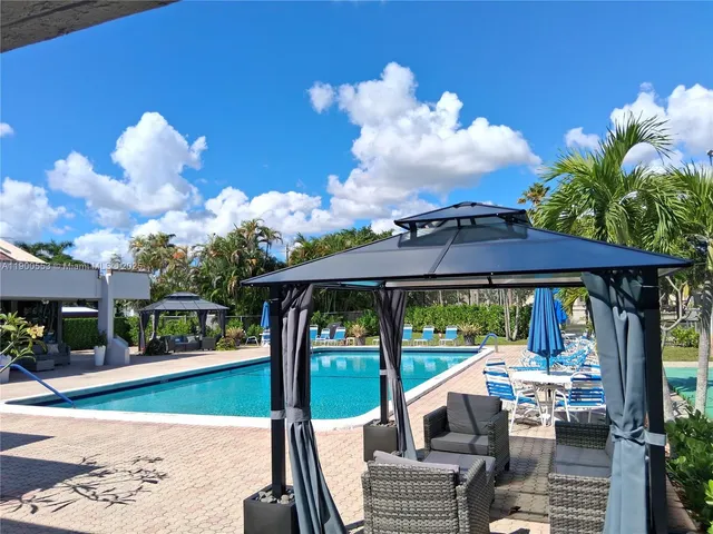 a view of a lake and a yard