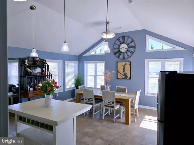a bathroom with a toilet sink and shower