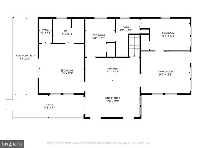 an aerial view of a house with swimming pool garden and patio