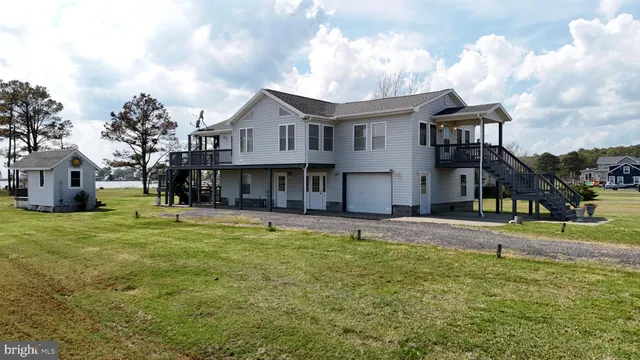 a table with food on it and a dining table with wooden floor