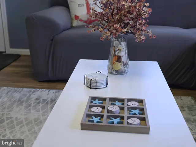 a view of a dining room furniture and a chandelier