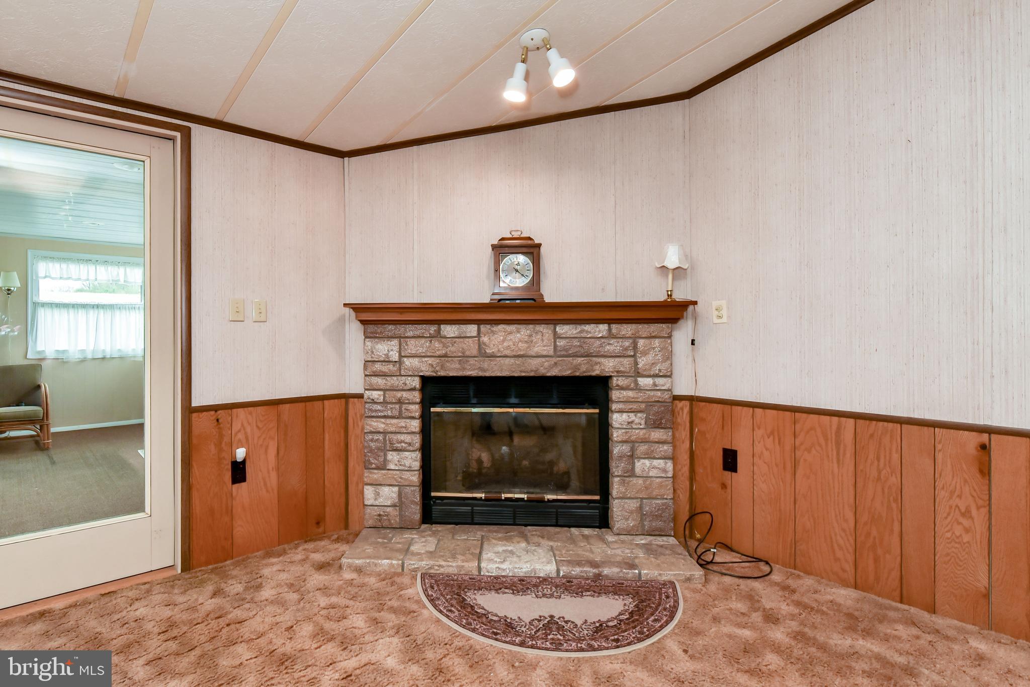 396 Connelly Road Rising Sun, MD 21911 - Photo 7 of 32 FIREPLACE FOR COZY WINTER NIGHTS