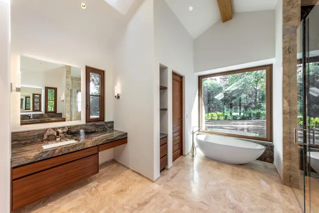 a view of swimming pool from a living room