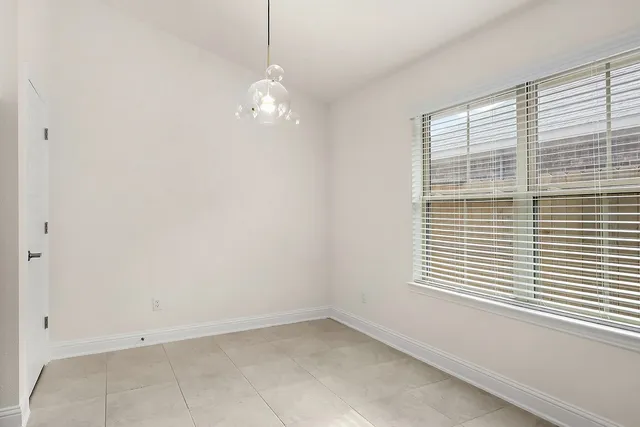 a view of empty room with a window