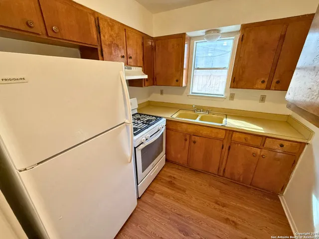 a utility room with washer and dryer