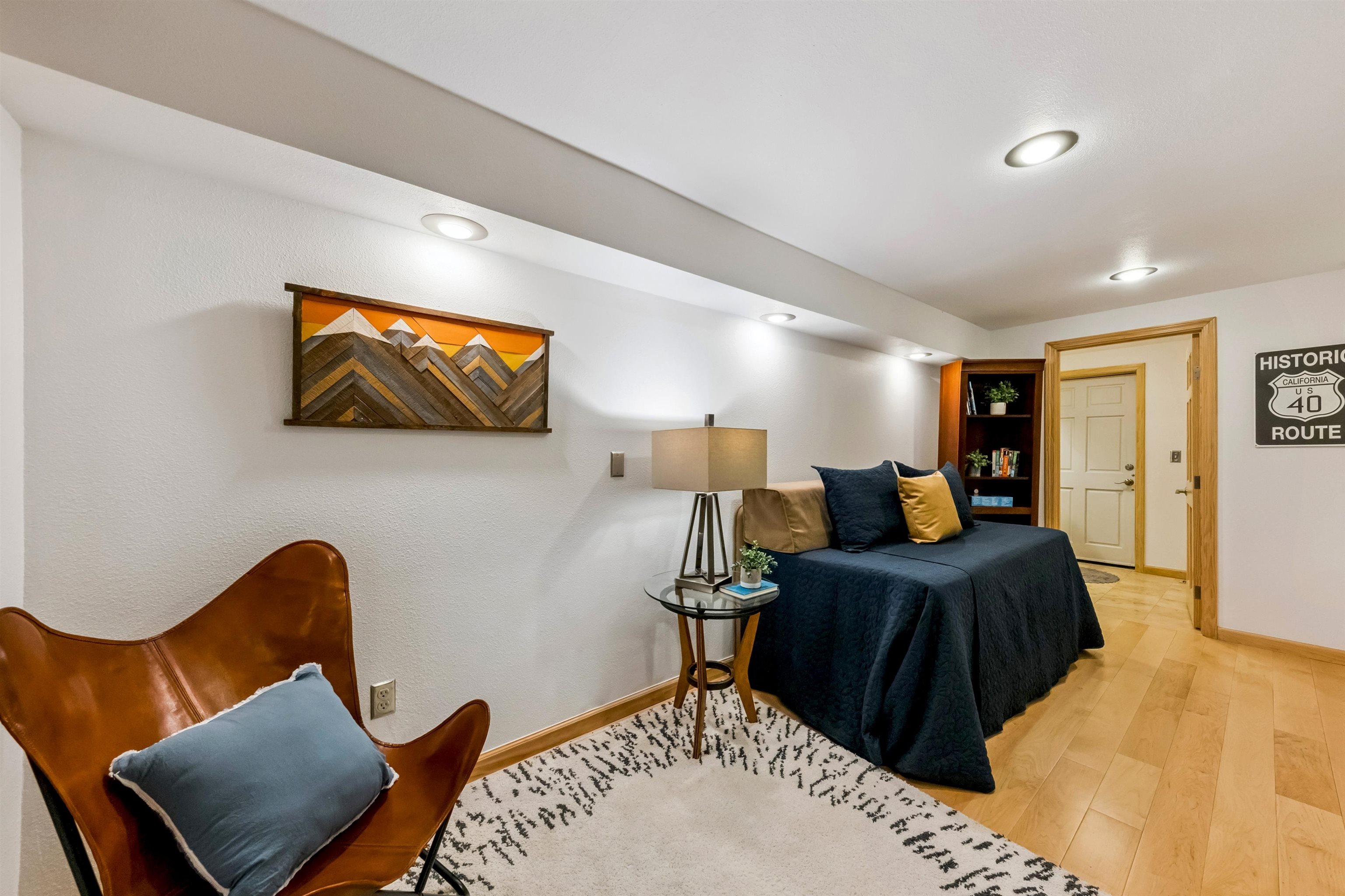 12705 Falcon Point Place Truckee, CA 96161 - Photo 22 of 28 a bedroom with furniture and a wooden floor