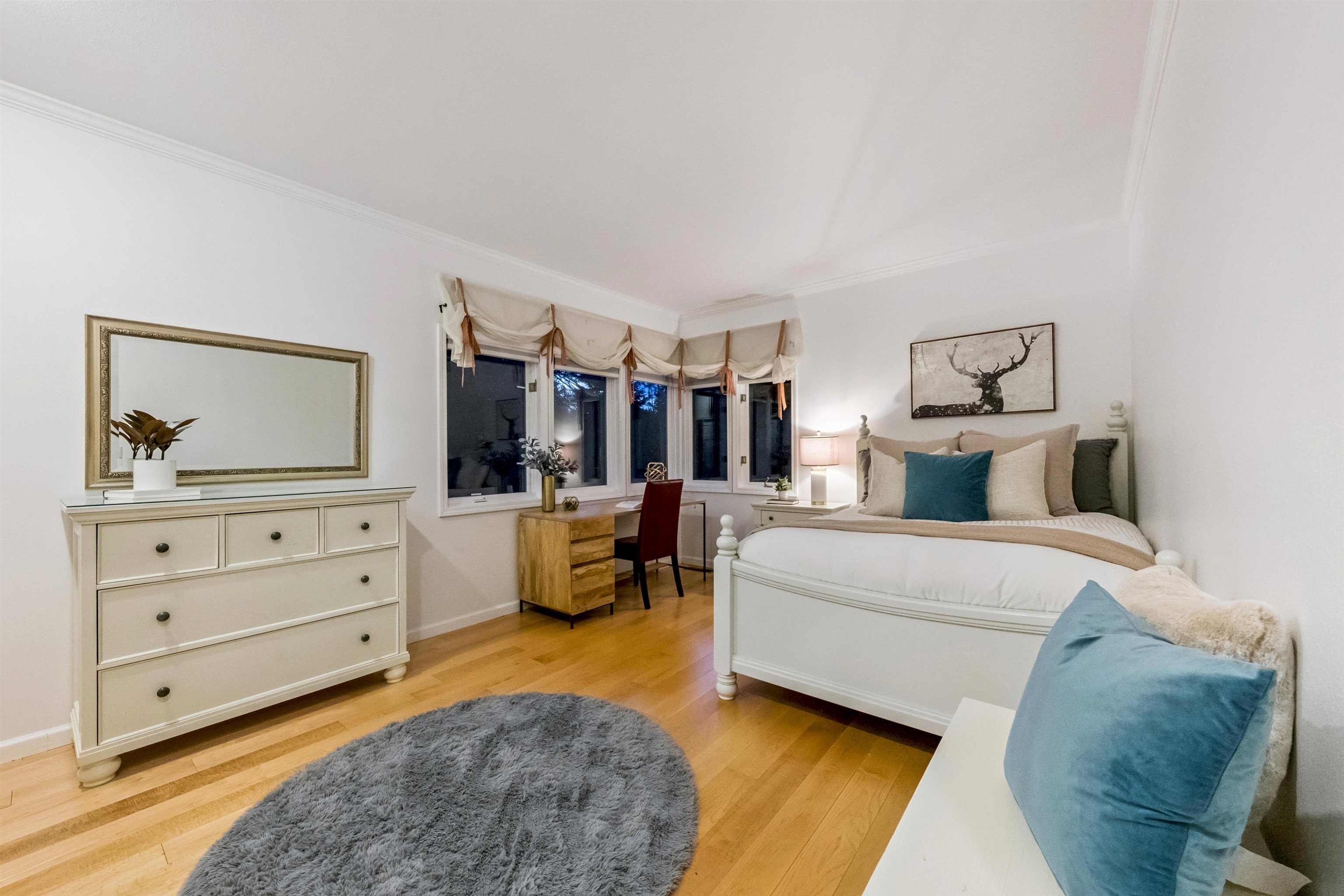 12705 Falcon Point Place Truckee, CA 96161 - Photo 24 of 28 a living room with furniture and a flat screen tv