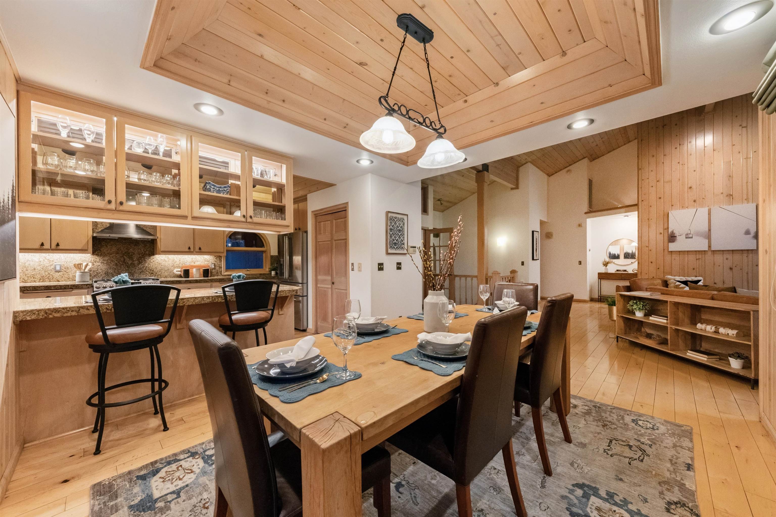 12705 Falcon Point Place Truckee, CA 96161 - Photo 9 of 28 a view of a dining room with furniture window and wooden floor
