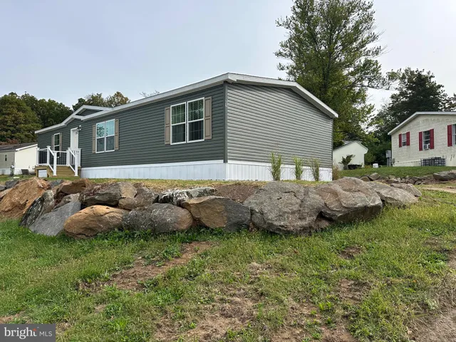 a house view with a backyard space