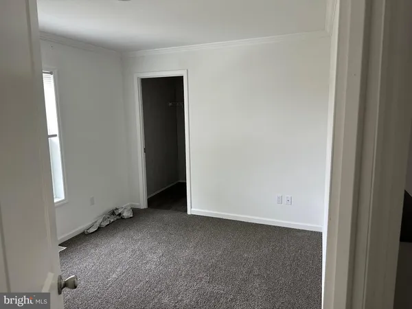 an empty room with closet