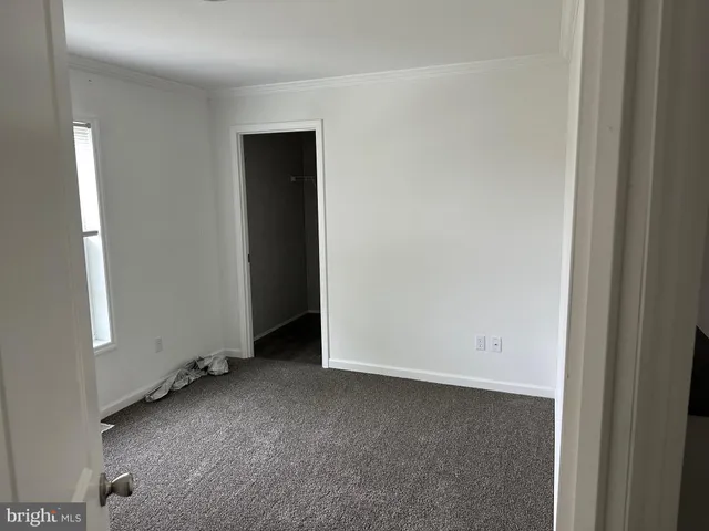 an empty room with closet