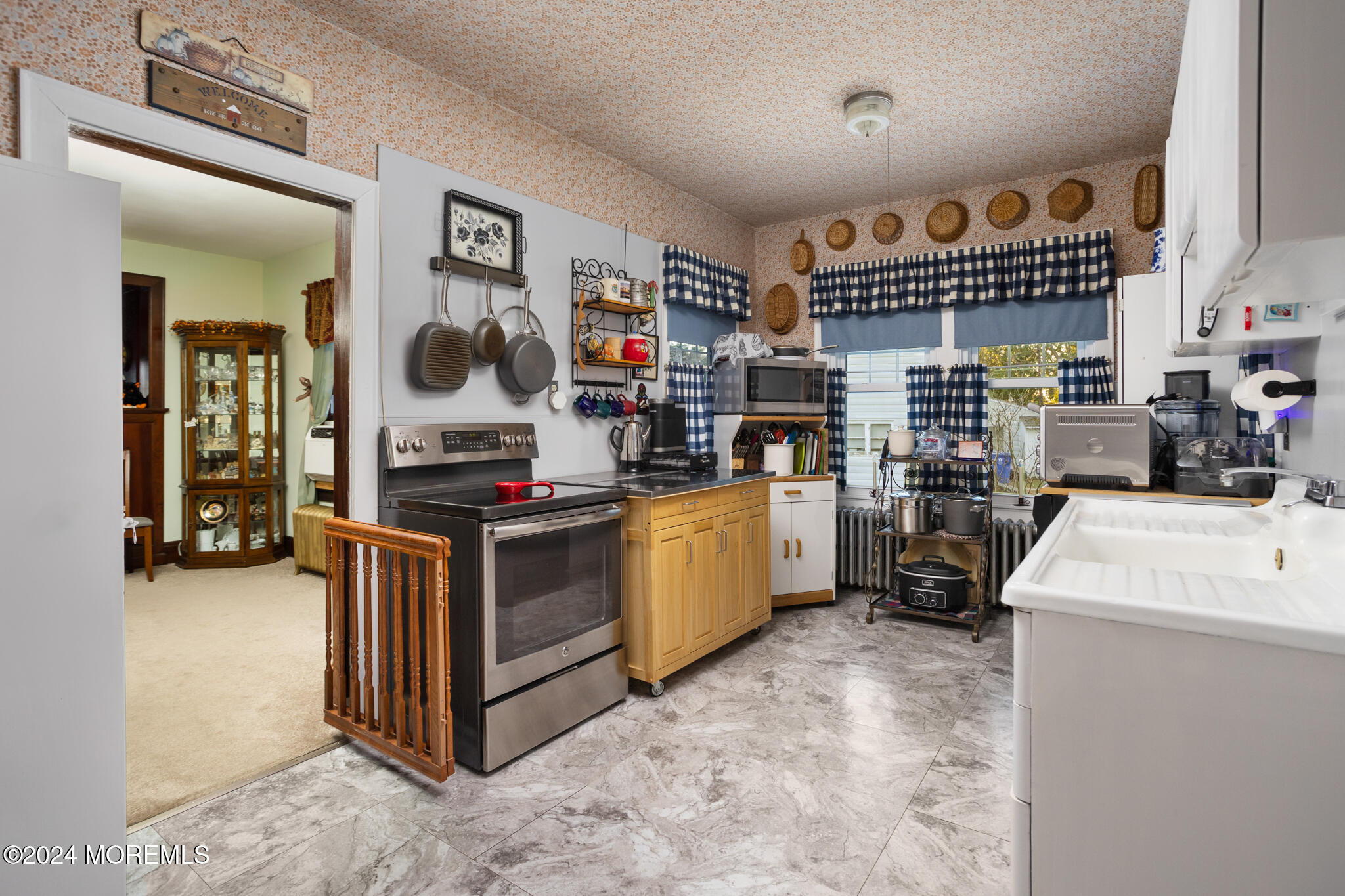 2149 Jacksonville Jobstown Road Jobstown, NJ 08041 - Photo 19 of 48 a kitchen with stainless steel appliances granite countertop a stove and a refrigerator
