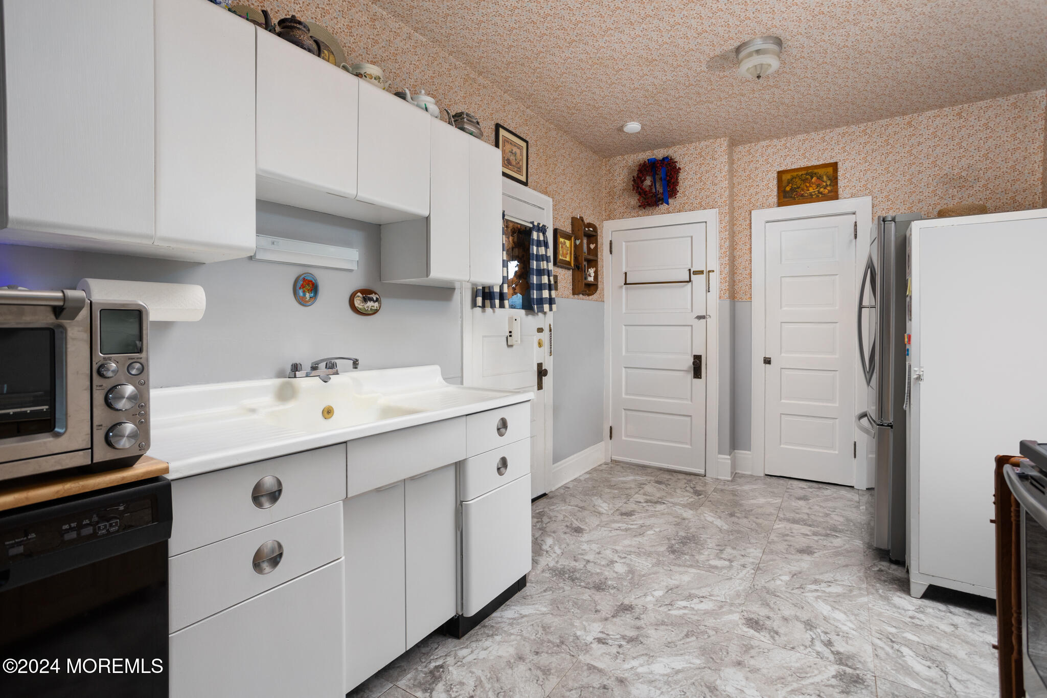 2149 Jacksonville Jobstown Road Jobstown, NJ 08041 - Photo 21 of 48 a kitchen with white cabinets and white appliances